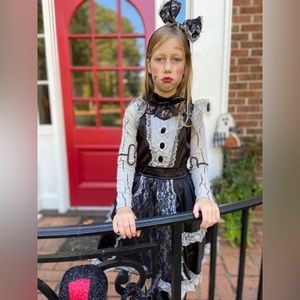 Broken Doll costume from Spirit Halloween
